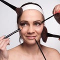 Applying makeup to the face Royalty Free Stock Photo