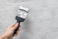 Putty or plaster to a vertical wall in a renovated house with a spatula or trowel Royalty Free Stock Photo