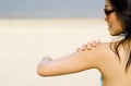 Applying Suncream At Beach Royalty Free Stock Photo