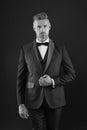 Appreciate classics. Bearded man with formal look. Hipster black background. Brutal man in tuxedo suit. Classic can make Royalty Free Stock Photo