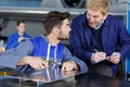 Apprentice aerospace engineer asking tutor question