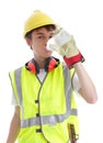 Apprentice builder drinking ice cold water Royalty Free Stock Photo