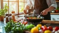 apprentice chef carefully preparing a dish in a bustling restaurant kitchen Royalty Free Stock Photo