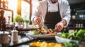 apprentice chef carefully preparing a dish in a bustling restaurant kitchen Royalty Free Stock Photo