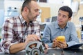 apprentice and teacher in science workshop Royalty Free Stock Photo