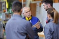 Apprentice in workshop factory with teacher Royalty Free Stock Photo