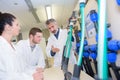 apprentices checking stock levels in store room Royalty Free Stock Photo