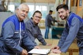 Apprentices in woodcraft with instructor Royalty Free Stock Photo