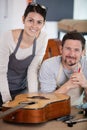 apprenticeship in guitar work shop Royalty Free Stock Photo
