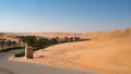 Access through dunes to Desert Hotel, Abu Dhabi. Qasr Al Sarab Resort and Hotel, Abu Dhabi, United Arab Emirates