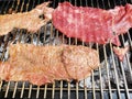 approach to grill with charcoal roasted meat