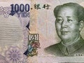 approach to japanese banknote of 1000 yen and Chinese banknote of one yuan