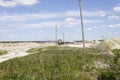 Approaching freight train with train cars working on chalk mining Royalty Free Stock Photo