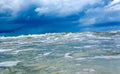 Approaching huge wave in the blue cold sea or ocean. Tsunami, storm hurricane Royalty Free Stock Photo