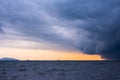 Approaching storm cloud with rain over the sea Royalty Free Stock Photo