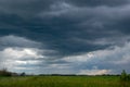 Approaching storm clouds above a canola field, Saskatchewan, Can Royalty Free Stock Photo