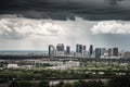 approaching storm clouds, with view of city skyline visible in the distance