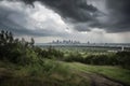 approaching storm clouds, with view of city skyline visible in the distance