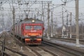 Approaching suburban electric train ET2M on a March day Royalty Free Stock Photo