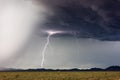 Approaching thunderstorm with lightning bolt Royalty Free Stock Photo