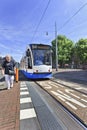 Approaching tram in Amsterdam Old Town Royalty Free Stock Photo