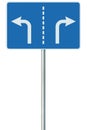 Appropriate traffic lanes for different manoeuvres at a junction ahead road sign, isolated blue rectangular signpost, white arrows Royalty Free Stock Photo