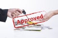 Approved mortgage loan agreement with car and key.