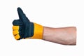 Approving gesture. Thumbs up. Man& x27;s hand in construction glove shows that everything is fine. Close-up. Royalty Free Stock Photo