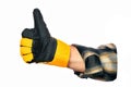 Approving gesture. Thumbs up. Man& x27;s hand in construction glove shows that everything is fine. Close-up. Royalty Free Stock Photo
