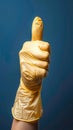 Approving sign Hand in rubber glove offers thumbs up gesture