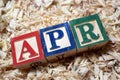 APR annual percentage rate acronym on wooden block Royalty Free Stock Photo