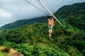 Apr 23, 2017 Adult woman, Zip line adventure at Mountain lake resort in Cavinti Philippines Royalty Free Stock Photo