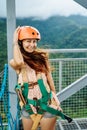 Apr 23, 2017 Adult woman, Zip line adventure at Mountain lake resort in Cavinti Philippines Royalty Free Stock Photo