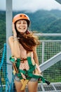 Apr 23, 2017 Adult woman, Zip line adventure at Mountain lake resort in Cavinti Philippines Royalty Free Stock Photo