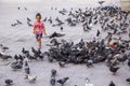 Lots of pigeons and local people in Doha