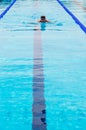 Male swimmer in Olympic standard swimming pool