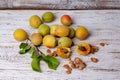 Apricot fruit. Fresh organic apricots on a white wooden background Royalty Free Stock Photo