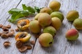 Apricot fruit. Fresh organic apricots on a white wooden background Royalty Free Stock Photo