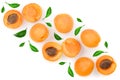 Apricot fruits with leaves isolated on white background with copy space for your text. Top view. Flat lay pattern Royalty Free Stock Photo