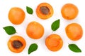 Apricot fruits with leaves isolated on white background. Top view. Flat lay pattern Royalty Free Stock Photo