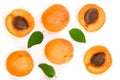 Apricot fruits with leaves isolated on white background. Top view. Flat lay pattern Royalty Free Stock Photo