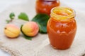 Apricot jam in glass jars with fresh fruit Royalty Free Stock Photo