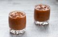 Apricot jam in two glass jars on the table Royalty Free Stock Photo