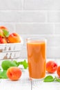 Apricot juice and fresh fruits Royalty Free Stock Photo