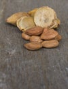 Apricot Kernels and pip on wood Royalty Free Stock Photo