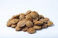 Apricot kernels on a white background. Royalty Free Stock Photo