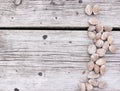 Apricot nuts wooden background. Top view with copyspace.