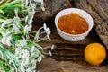 Apricot and peach jam in a small deep dish, sweet orange jam for dessert. Next to a whole fruit, apricots are marinated in syrup. Royalty Free Stock Photo