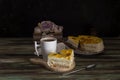 Apricot pie with cream and a cup of coffee close-up Royalty Free Stock Photo