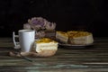 Apricot pie with cream and a cup of coffee close-up Royalty Free Stock Photo